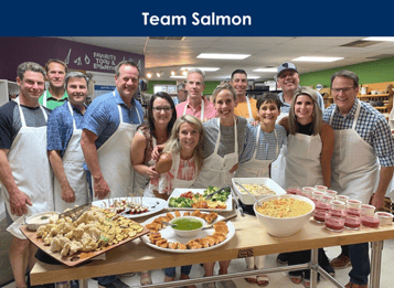 "Team Salmon", the winning team of 13 proudly stand behind their dishes.