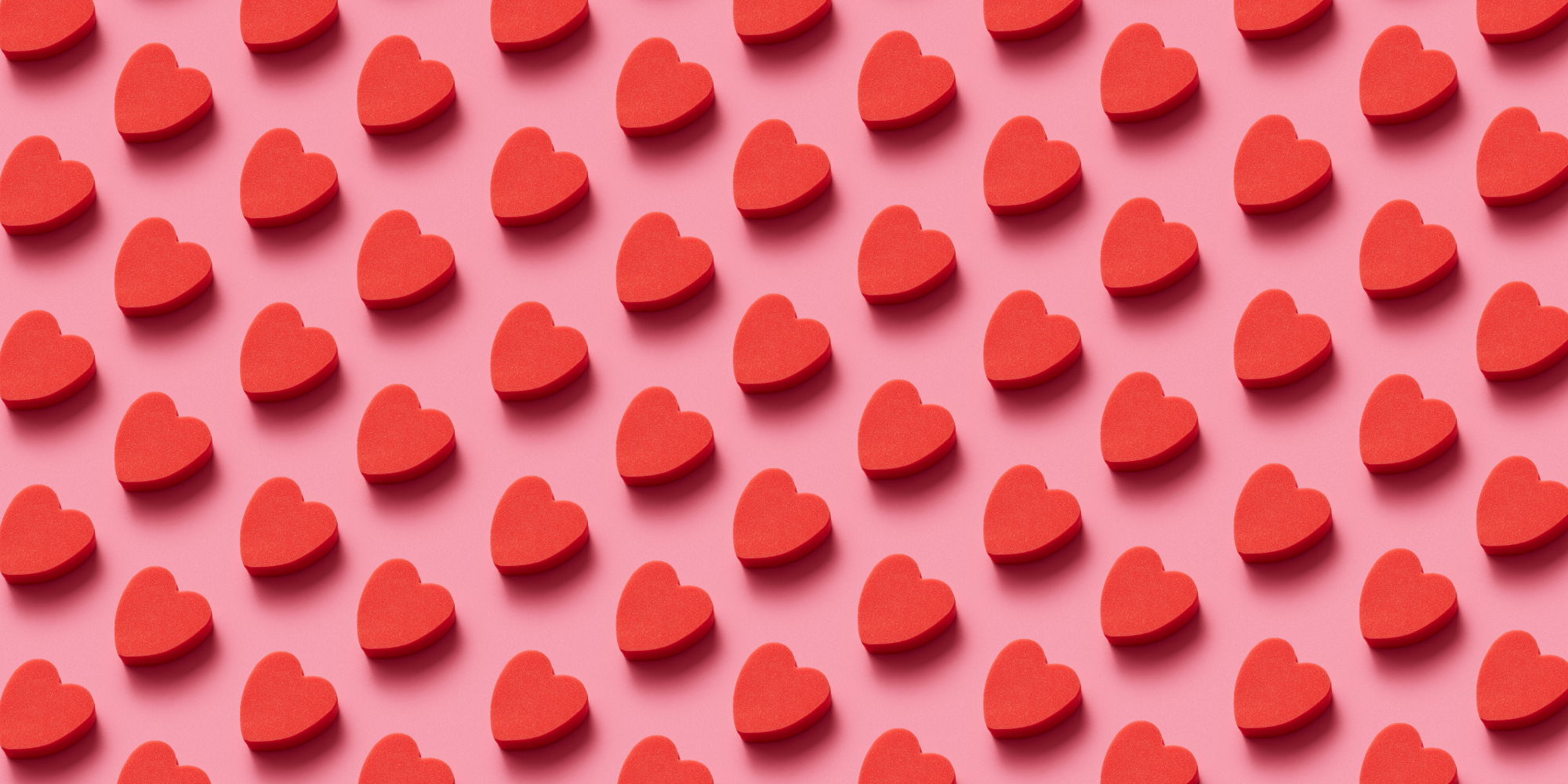 red hearts against a pink background
